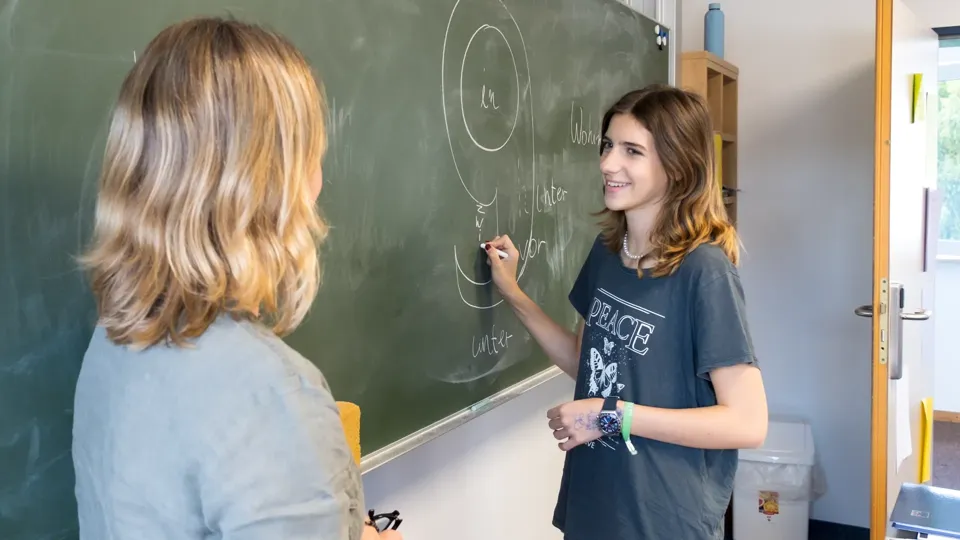At the blackboard